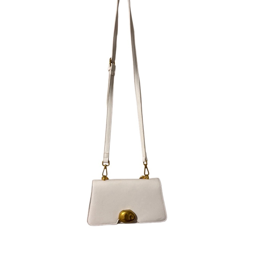 Chic lightweight vegan leather unique small back with removable strap